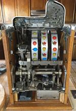 mechanical slot machine assemblies, genuine slot machines, counterfeit mechanical slot machines